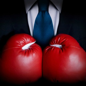 lawyer with boxing gloves biglaw v newlaw debate better offering to legal professionals