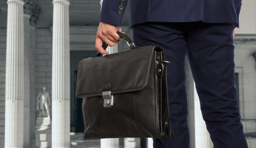 Professional man holding a briefcase