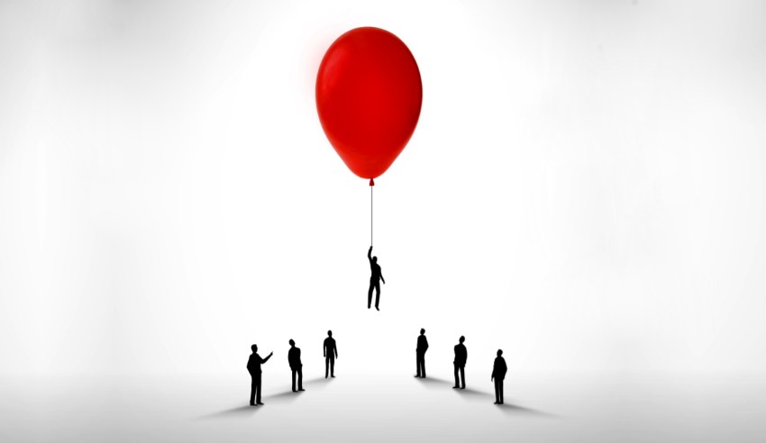 Success, opportunity, advantage, man holding a red balloon