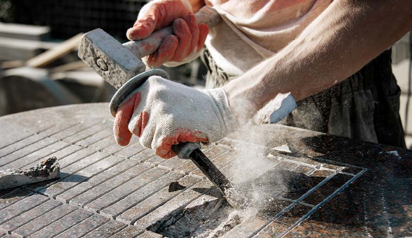 Stonemason carving