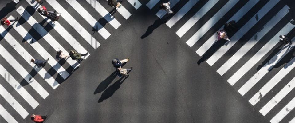 Birds eye view of busy street crossing Birds eye view of busy street crossing